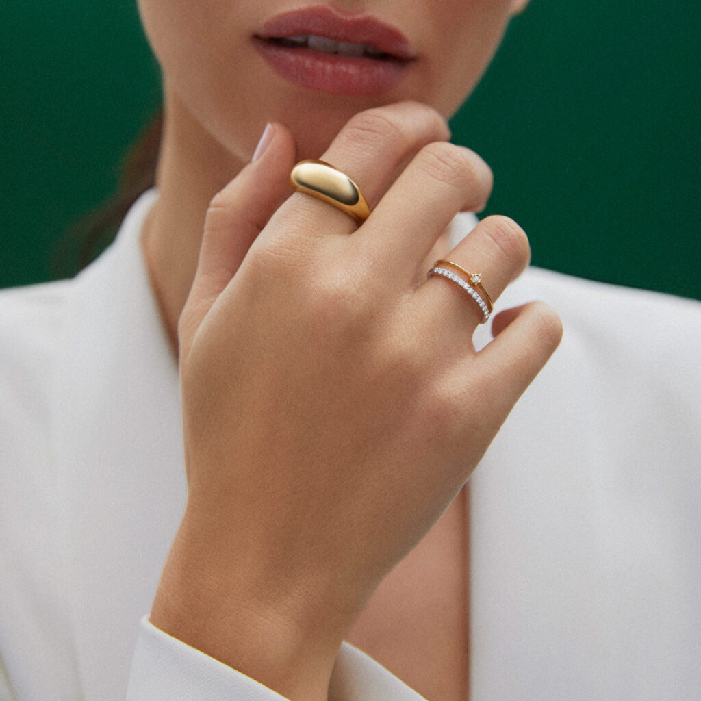 model with 18k gold rings