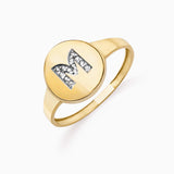 Anel de sinete com inicial de topázio branco em ouro amarelo 18K
