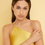 Pendientes Infinite Bonds en Oro Amarillo de 18 Kt