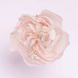 Brincos Petite Diamonds Cross em ouro amarelo 18K