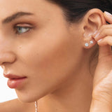 Pendientes Petite Diamonds Cross en Oro Blanco de 18 Kt