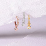 Brinco de argola Chaton com diamantes em ouro amarelo 18K