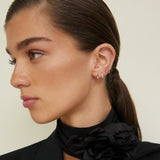 Brinco de piercing cruzado de rubi e diamante em ouro rosa 18K