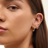 Brinco de piercing de cruz de diamante de ouro amarelo 18K