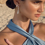 Brincos de lágrima de topázio azul-celeste e diamante em ouro branco 18 K
