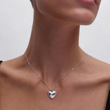 Charm Colgante Corazón Culpables en Oro Blanco de 18 Kt